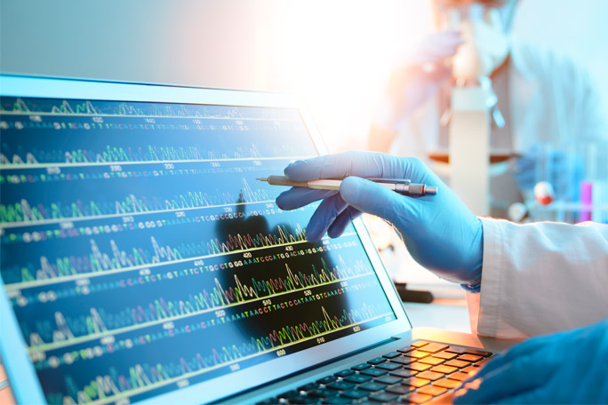 Scientist Looking at a DNA Sequence